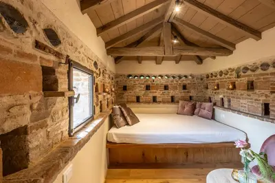 Letto o letti in una camera di Relais Corte Baruzzo