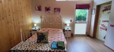 Letto o letti in una camera di La Libellula