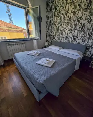 Letto o letti in una camera di Elios