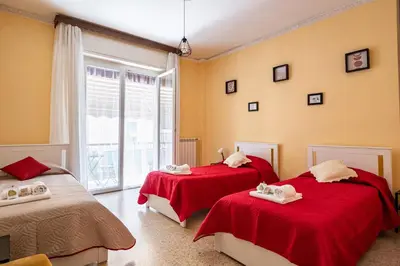 Letto o letti in una camera di GuestHost - Casa Bina