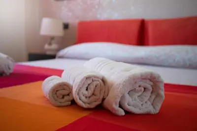 Letto o letti in una camera di PARISI Borgo Virgilio