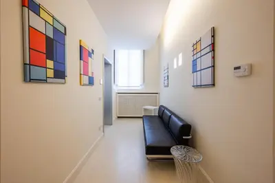 Area soggiorno di Mini-loft just steps from the Duomo of Modena