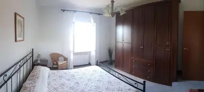 Letto o letti in una camera di Casa Stefania