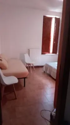 Letto o letti in una camera di Casa Manto