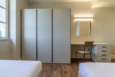 Letto o letti in una camera di Villa Amaranta - mytouristhome