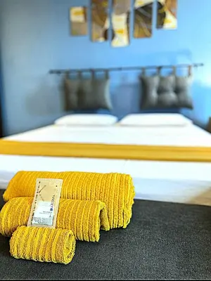Letto o letti in una camera di appartamento Lucia