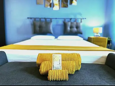 Letto o letti in una camera di appartamento Lucia