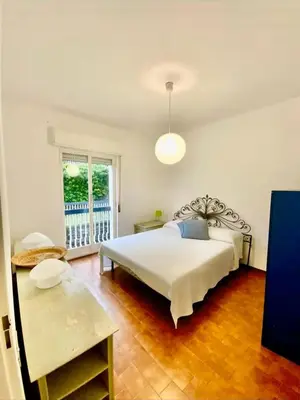 Letto o letti in una camera di Deiva Marina Home a due passi dalle 5 terre