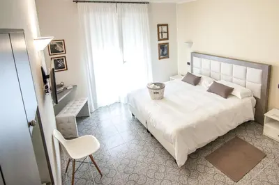 Letto o letti in una camera di Hotel Le Vigne di Corvino