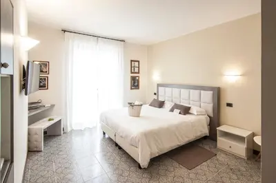 Letto o letti in una camera di Hotel Le Vigne di Corvino