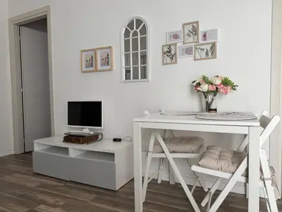 TV o dispositivi per l'intrattenimento presso Appartamento di Maison Rebecca