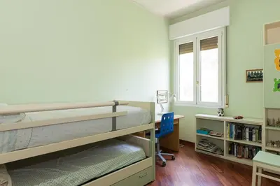 Letto o letti in una camera di Pit Stop MotorValley - Near Modena Old Town