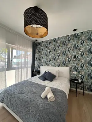 Letto o letti in una camera di Villa Luce 2
