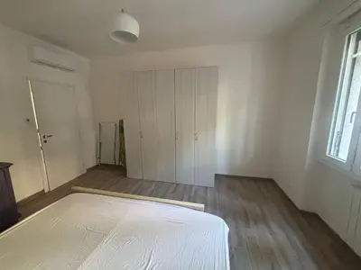 Letto o letti in una camera di Appartamento Primavera