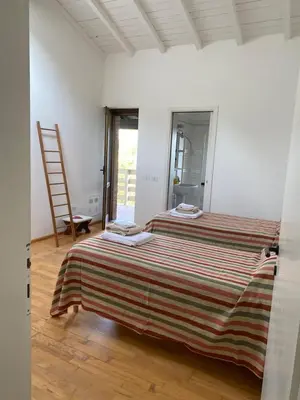 Letto o letti in una camera di Appartamento Nocciolo