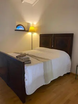 Letto o letti in una camera di Appartamento Nocciolo