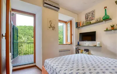 Letto o letti in una camera di 2 Bedroom Awesome Home In Moneglia