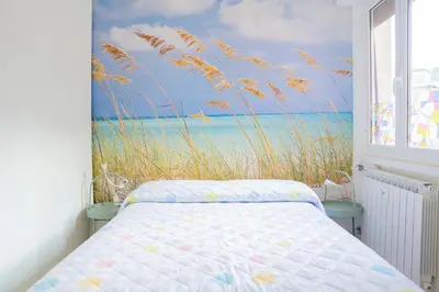 Letto o letti in una camera di 073C - Casa Rapallo con Attico privato, 10 minuti dal Mare Spiaggie a piedi