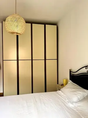 Letto o letti in una camera di Sun Apartment Rapallo