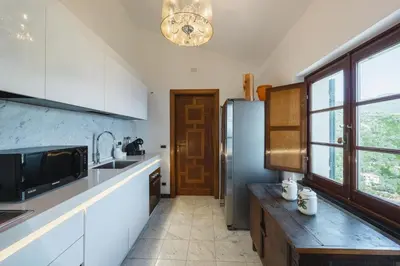 Cucina o angolo cottura di Villa with Pool - Unique Sea View - Free Parking