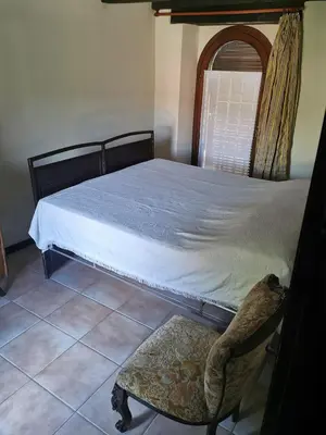 Letto o letti in una camera di Casa della Lupa