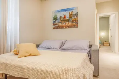 Letto o letti in una camera di Urban Eden Nest - Smart Oasis in the Motor Valley