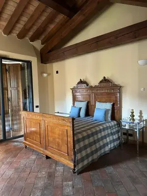 Letto o letti in una camera di Niviano Castello