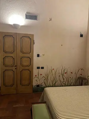 Letto o letti in una camera di Niviano Castello