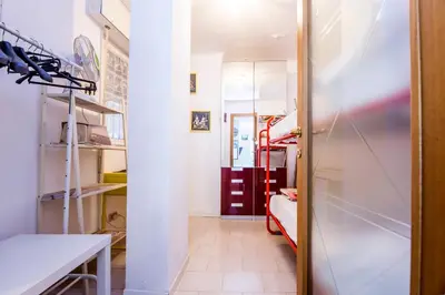 Letto o letti in una camera di JOIVY Bright 2-Bedroom Flat with Terrace near the Beach