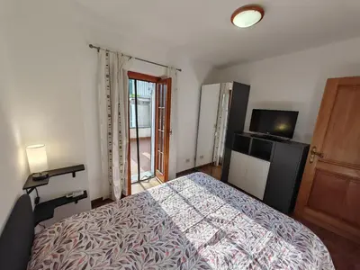 Letto o letti in una camera di Casa Le Rondini