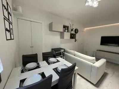 TV o dispositivi per l'intrattenimento presso L'Aldina - intero appartamento 2 camere ristrutturato Top a 2 passi dal centro