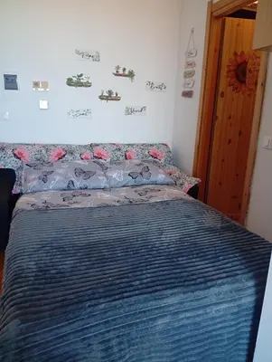 Letto o letti in una camera di Sunflower