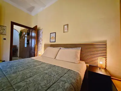 Letto o letti in una camera di Quiet Tortellini