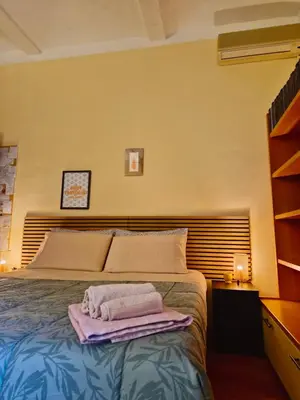 Letto o letti in una camera di Quiet Tortellini