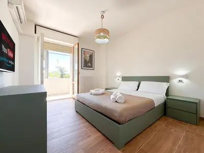Letto o letti in una camera di Modena Skyline - View on Ghirlandina