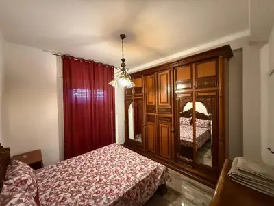 Letto o letti in una camera di Casa Bianca