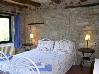 Letto o letti in una camera di B&b Il Tulipano