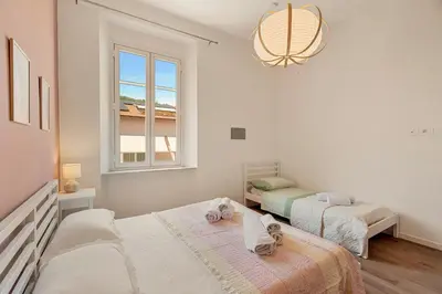 Letto o letti in una camera di La Casa Accanto