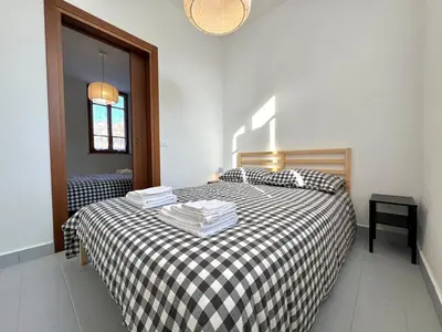 Letto o letti in una camera di O&R Home Crema
