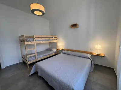 Letto o letti in una camera di Pedali di Liguria