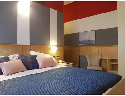 Letto o letti in una camera di Hotel Azzurra