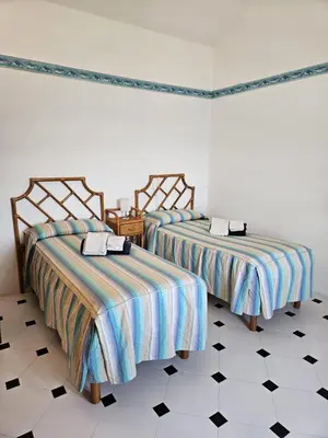 Letto o letti in una camera di Villa Onde e Ulivi