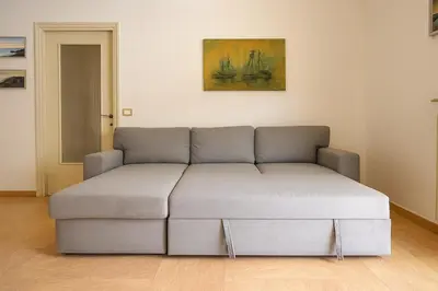 Area soggiorno di Xenia - 2 rooms apt in Corso Buenos Aires 73