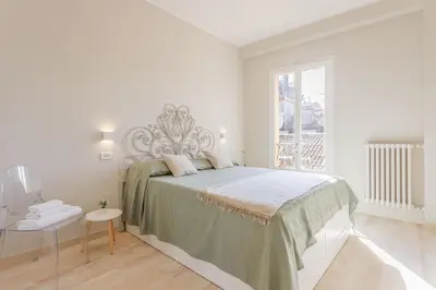 Letto o letti in una camera di Views on Ghirlandina in the heart of MotorValley