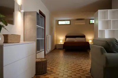 Letto o letti in una camera di B&B Villa Sassuolo by EUROMODENA