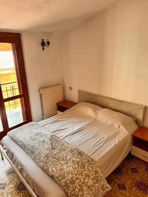 Letto o letti in una camera di Casa Stella