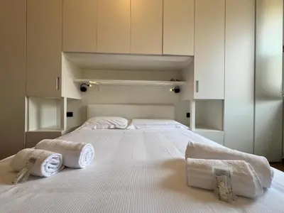 Letto o letti in una camera di ORO Apartment, Rapallo