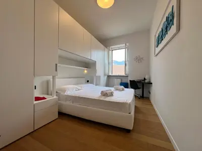 Letto o letti in una camera di ORO Apartment, Rapallo