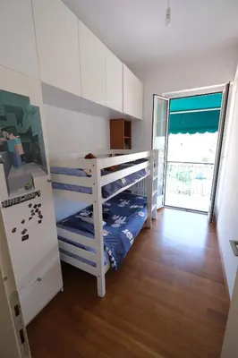 Letto o letti in una camera di Casa di Rawi by PortofinoVacanze
