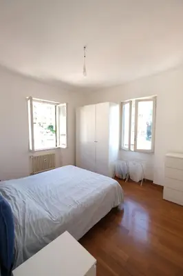 Letto o letti in una camera di Casa di Rawi by PortofinoVacanze